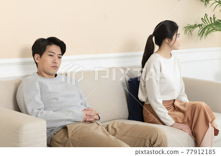 angry Asian couple, not talking to each other angry Asian couple, not talking to each other 77912185