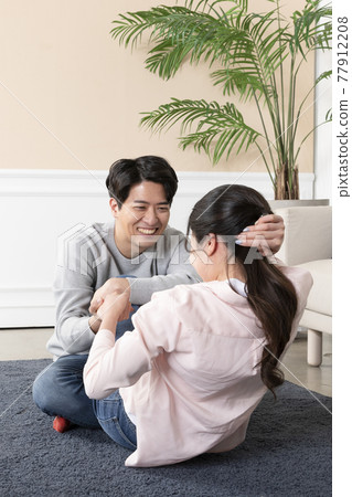 Asian couple home training Asian couple home training 77912208