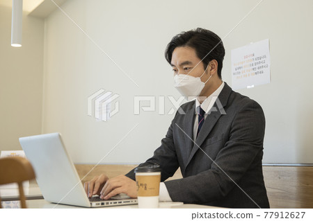 Asian businessman, customer with mask in cafe, business during covid virus concept Asian businessman, customer with mask in cafe, business during covid virus concept 77912627