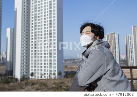 Asian man walking, strolling with mask Asian man walking, strolling with mask 77912808