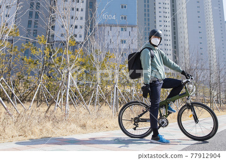 bike delivery service man with mask bike delivery service man with mask 77912904