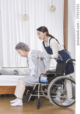 Asian caregiver and old woman at nursing home, hospital Asian caregiver and old woman at nursing home, hospital 77913352