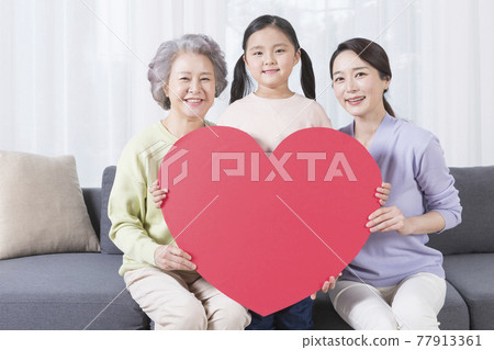 three generations of women, Asian grandmother, mother and grand daughter three generations of women, Asian grandmother, mother and grand daughter 77913361