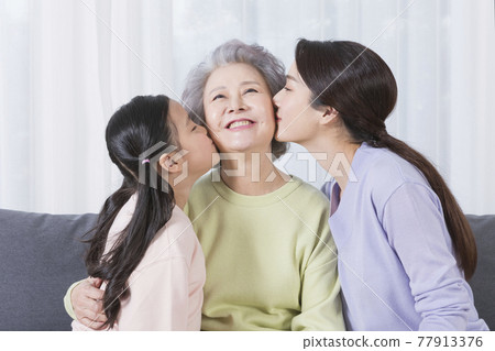 three generations of women, Asian grandmother, mother and grand daughter 77913376
