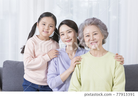 three generations of women, Asian grandmother, mother and grand daughter three generations of women, Asian grandmother, mother and grand daughter 77913391