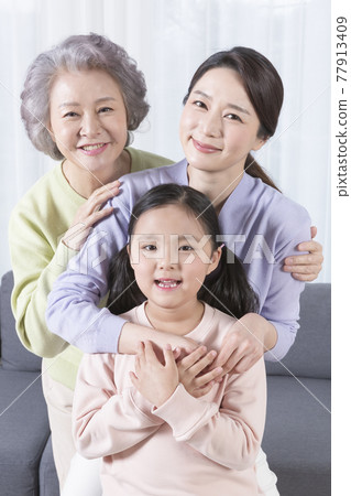 three generations of women, Asian grandmother, mother and grand daughter three generations of women, Asian grandmother, mother and grand daughter 77913409