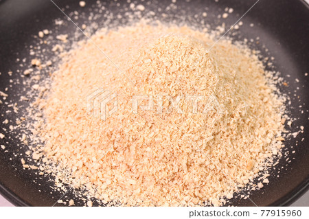 Rice bran on a plate 77915960
