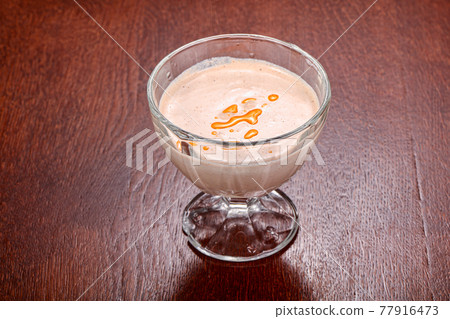Georgian tradional Mastsoni dessert in the bowl 77916473