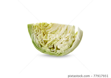 One cut off section of raw cabbage isolated on white background. Ripe vegetable, summer harvest. Close up, copy space 77917931