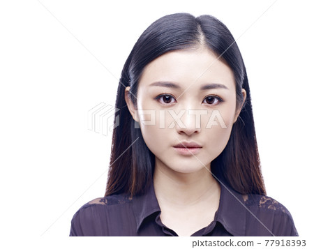 passport photo of a young and beautiful asian girl, isolated on white background passport photo of a young and beautiful asian girl, isolated on white background 77918393