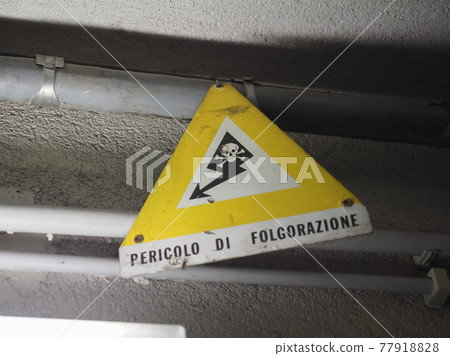 Italian sign Danger electric shock Italian sign Danger electric shock 77918828