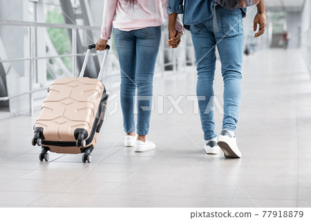 Air Transportation. Cropped Image Of Black Couple Walking With Luggage In Airport 77918879