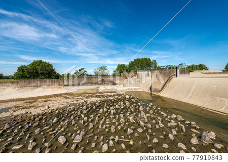 Reinforced Concrete Irrigation Canal with Dam in the Padan Plain - Lombardy Italy Reinforced Concrete Irrigation Canal with Dam in the Padan Plain - Lombardy Italy 77919843