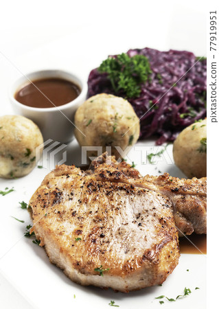 german style grilled pork chop with bread dumplings traditional meal german style grilled pork chop with bread dumplings traditional meal 77919951