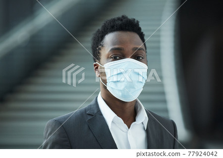 African American Businessman Wearing Mask African American Businessman Wearing Mask 77924042