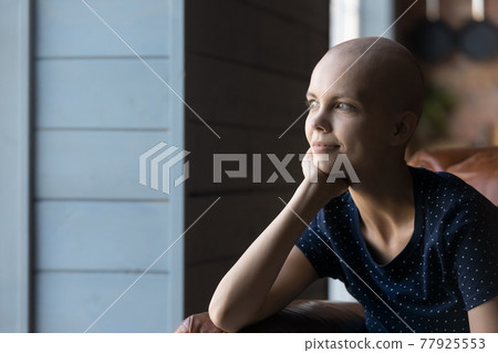 Thoughtful hairless ill woman fighting against cancer 77925553