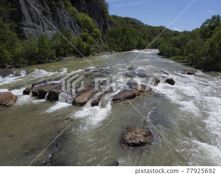 Toyohira River rises due to dam discharge (with video material taken at the same time as aerial photography) 77925692