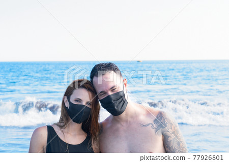 Happy young couple at the sea vacations Happy young couple at the sea vacations 77926801