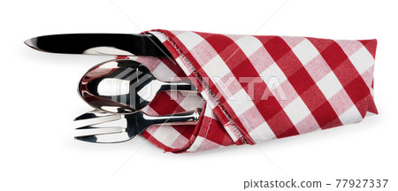 Set of cutlery wrapped in a napkin isolated on white background Set of cutlery wrapped in a napkin isolated on white background 77927337