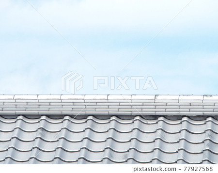 Blue sky and roof tiles 77927568