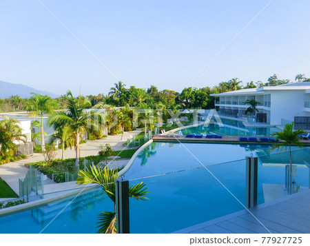 Pool seen from a resort hotel room in Port Douglas Pool seen from a resort hotel room in Port Douglas 77927725