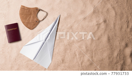 Flat lay top view of face mask and passport, summer holiday and travel concept. Flat lay top view of face mask and passport, summer holiday and travel concept. 77931733