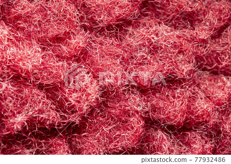 Close up of red fleece material Close up of red fleece material 77932486