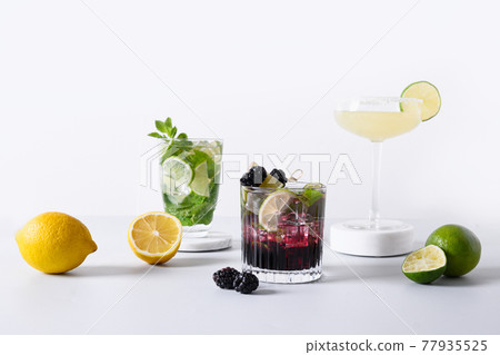 Classic and blackberry mojito, margarita cocktail with lime. Classic and blackberry mojito, margarita cocktail with lime. 77935525