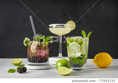 Classic and blackberry mojito, margarita cocktail with lime. Classic and blackberry mojito, margarita cocktail with lime. 77935533