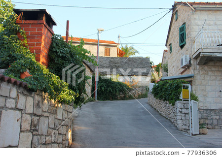 Street in the town Supetar on Brac 77936306