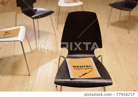 Mental support group journals on group of chairs 77938257