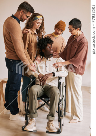 Person with Disability at Group Therapy Session 77938502