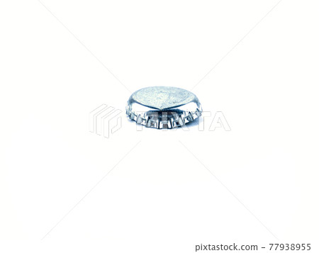 Beer bottle cap on a white background. Beer bottle cap on a white background. 77938955