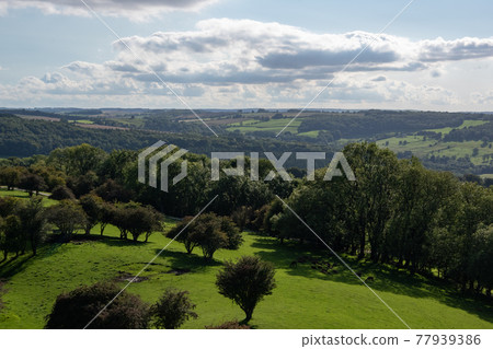 Scenery of the Cotswolds seen from a hill Scenery of the Cotswolds seen from a hill 77939386