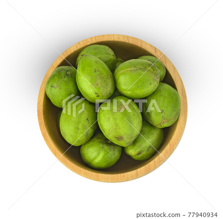 Top view of Chebulic Myrobalans, Myrolan Wood (Terminalia chebula Retz.) Fruit, medicinal properties. on white background 77940934