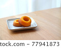 Sugar donuts on a plate 77941873