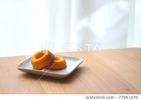 Sugar donuts on a plate Sugar donuts on a plate 77941876