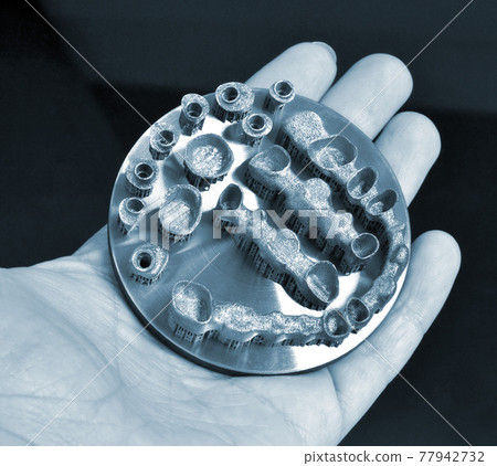 Object printed on metal 3d printer isolated. Object printed on metal 3d printer isolated. 77942732