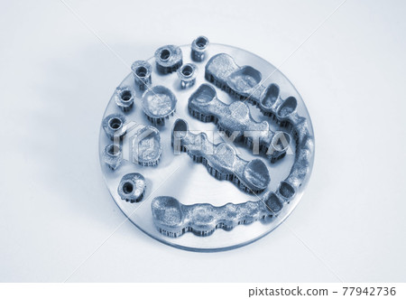 Object printed on metal 3d printer isolated. Object printed on metal 3d printer isolated. 77942736