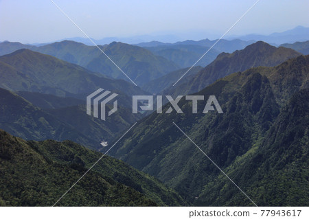 A superb view from Odaigahara, Nara Prefecture, Japan, a distant view of Mt. Omine 77943617