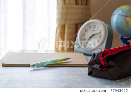 Study tools placed on the study desk 77943625