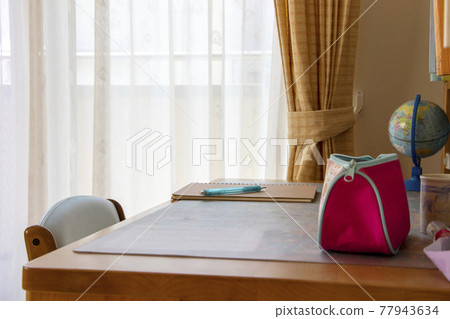 Study desk by the window 77943634