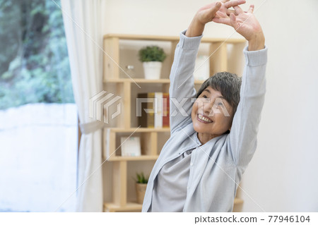 Senior women exercising gymnastics 77946104