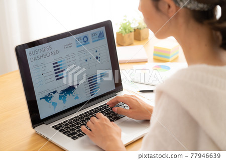 Young woman working online Young woman working online 77946639