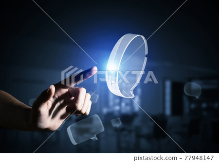 Concept of communication by glass empty chat icon on gray background. Mixed media Concept of communication by glass empty chat icon on gray background. Mixed media 77948147