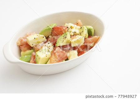 Avocado, tomato and mozzarella salad Avocado, tomato and mozzarella salad 77948927
