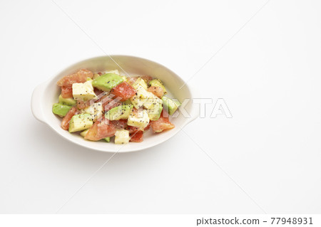 Avocado, tomato and mozzarella salad Avocado, tomato and mozzarella salad 77948931