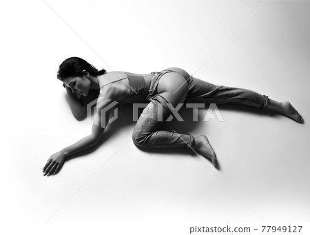 Black and white. Top view of young pretty woman in Black and white. Top view of young pretty woman in 77949127
