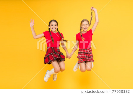 Join celebration. Kids girl wear checkered dresses. National holiday.  77950382