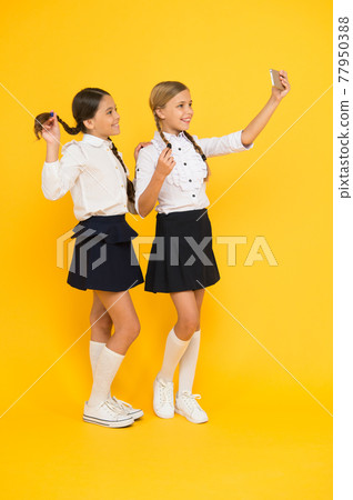 Personal blog. Girls school uniform take selfie smartphone Personal blog. Girls school uniform take selfie smartphone 77950388